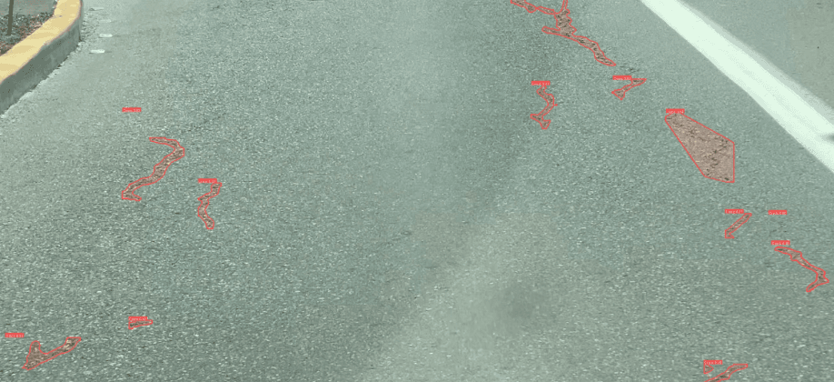 AI crack detection highlighting pavement defects
