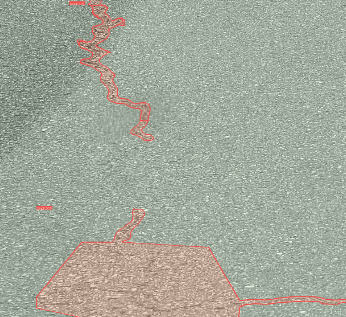 AI crack detection highlighting multiple pavement defects